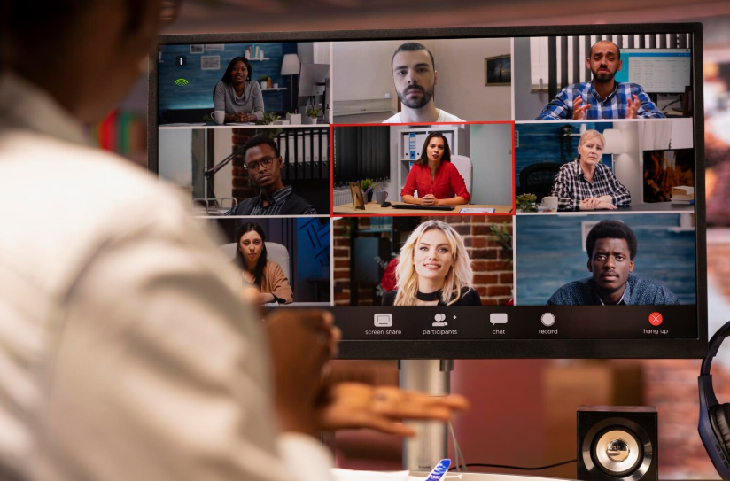 Global team on video call using AI translation in global business to collaborate in real time.